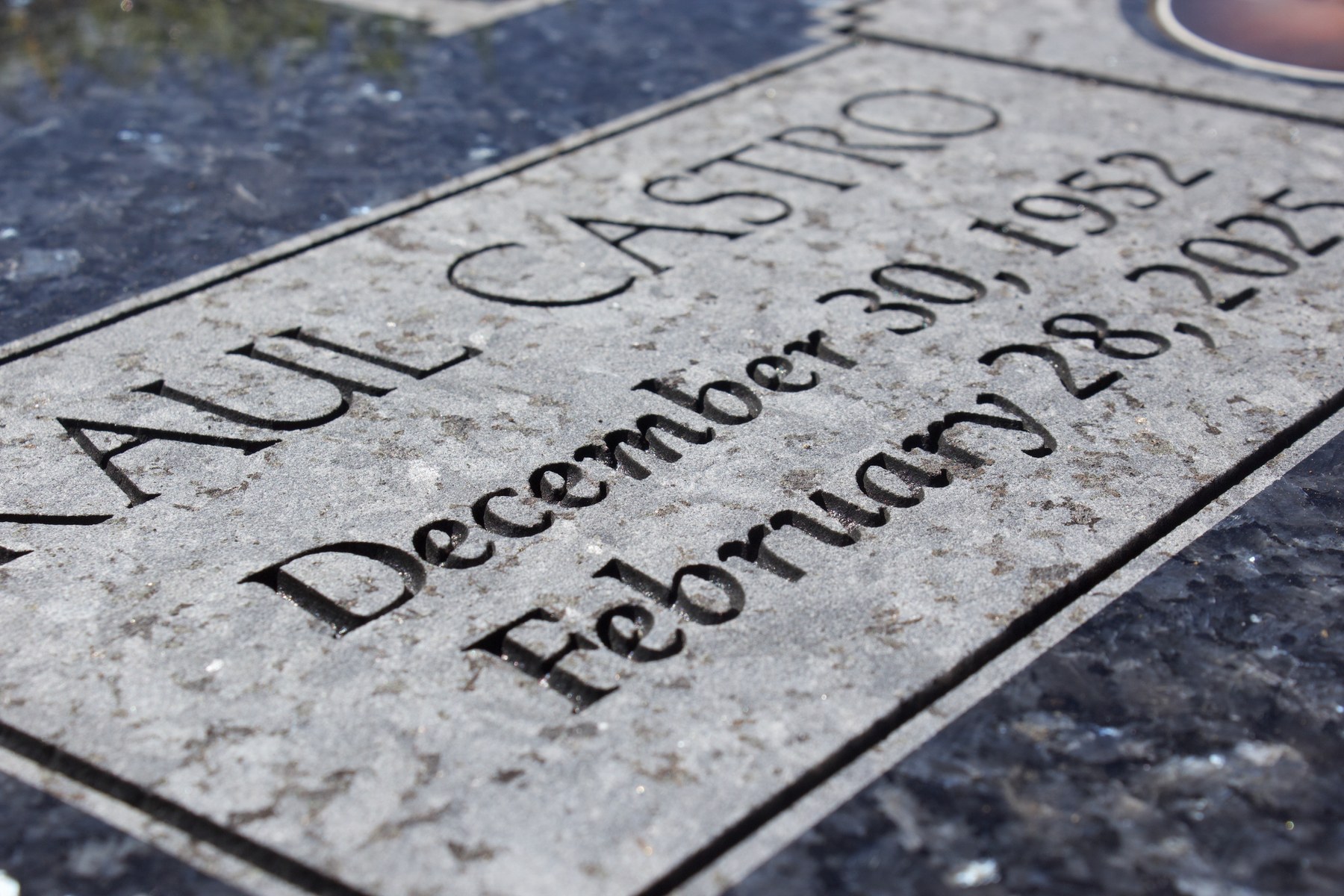 Close detail of engraved granite memorial lettering by GVG Memorials